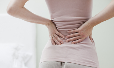 woman having lower back pain